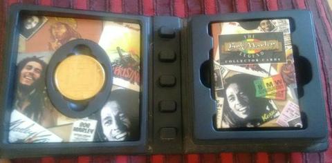 Moeda e 50 Cartões do Bob Marley usados