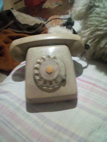 Telefone antigo e outras antiguidade