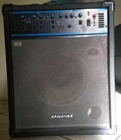 Caixa amplificada Multiuso Oneal Ocm 812, ideal para eventos, voz e violão, barzinhos