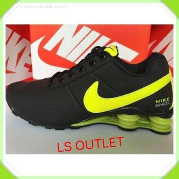 Tênis Nike importado com amortecedor preto/amarelo