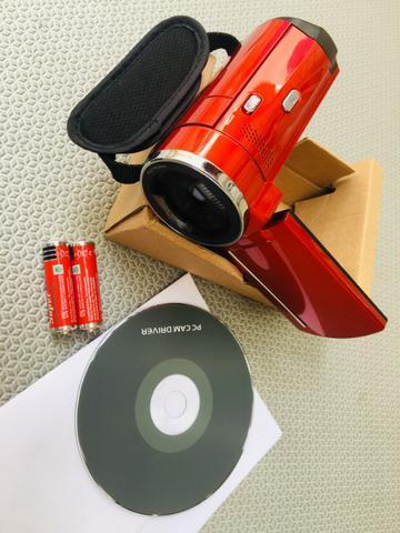 Filmadora e máquina de fotos Nova, completa na caixa com cabo, manual e Dvd