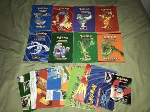 Revistas tipo livro Pokémon e posters Itens pokemon